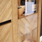 Nikomedes Display Cabinet In Spica Oak, Matt Black & Bartex Oak - Price Crash Furniture