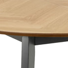 Georgetown Round 6 Seat Dining Table In Oak & Black - Price Crash Furniture