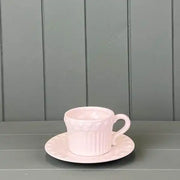 White Ribbed Ceramic Cup and Saucer with Heart Pattern