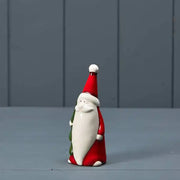 Ceramic Santa holding tree 5x4.5x12cm