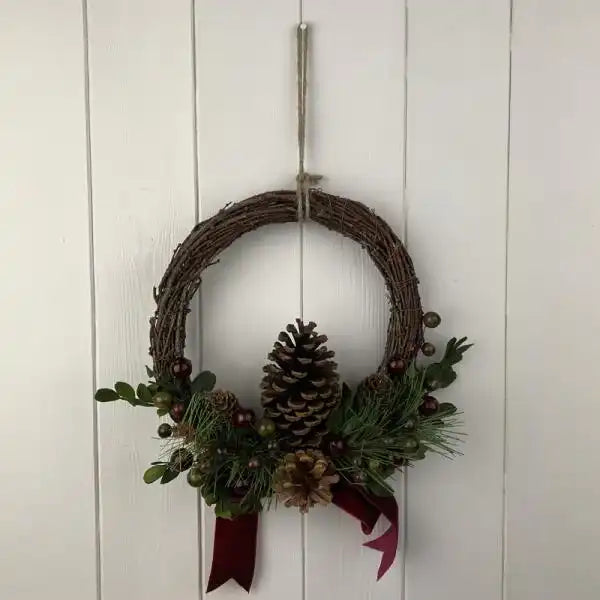 Rattan Pinecone and Berry Wreath with Bow D24cm