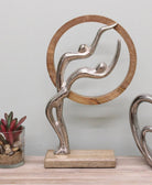 Abstract Ornament, Silver Couple In Wooden Circle, 31cm. - Price Crash Furniture