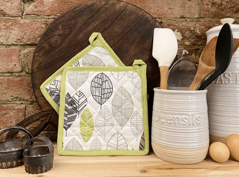 Two Fabric Pot or Pan Mats With Contemporary Green Leaf Print Design - Price Crash Furniture